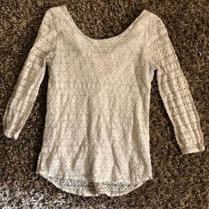 3/4 cream lace shirt with bow on back.